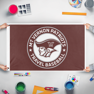 A mockup of the custom flag 'MVPats flag' held up on a table during print checking