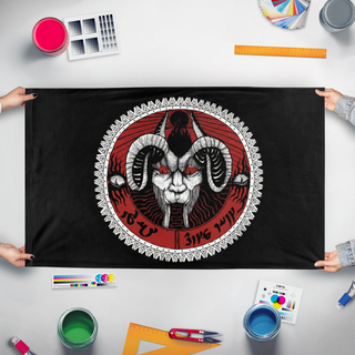 A mockup of the custom flag 'T flag' held up on a table during print checking