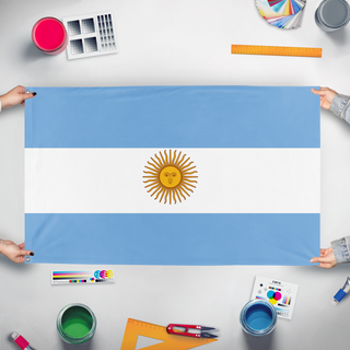 A mockup of the custom flag 'Argentina  flag' held up on a table during print checking