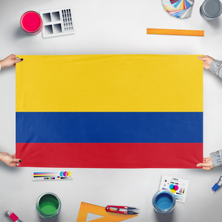 A mockup of the custom flag 'Colombia  flag' held up on a table during print checking