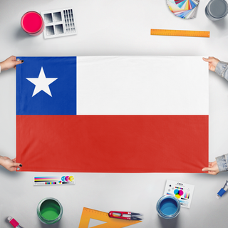 A mockup of the custom flag 'Chile flag' held up on a table during print checking