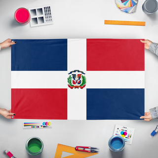 A mockup of the custom flag 'Domainican replupic flag' held up on a table during print checking