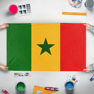 A mockup of the custom flag 'Senegal flag' held up on a table during print checking