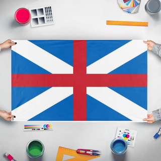 A mockup of the custom flag 'Anglo-Scottish Union Flag' held up on a table during print checking