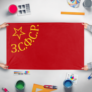 A mockup of the custom flag 'Flag of the Transcaucasian SFSR' held up on a table during print checking