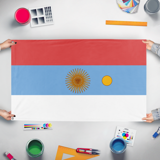 A mockup of the custom flag 'test3 flag' held up on a table during print checking