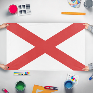 A mockup of the custom flag 'test flag' held up on a table during print checking