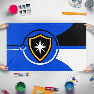 A mockup of the custom flag 'New Citadel flag' held up on a table during print checking