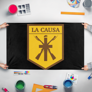 A mockup of the custom flag 'la causa' held up on a table during print checking