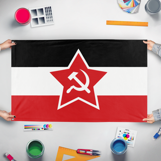 A mockup of the custom flag 'Communist Germany flag' held up on a table during print checking