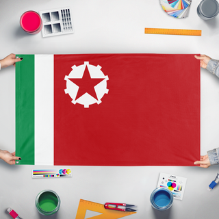 A mockup of the custom flag 'Communis Flag of Italy' held up on a table during print checking