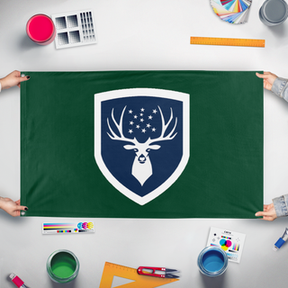 A mockup of the custom flag 'green moutain company flag' held up on a table during print checking