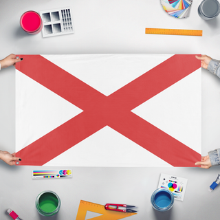 A mockup of the custom flag 'Alabama flag' held up on a table during print checking