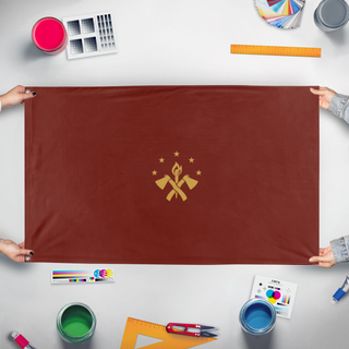 A mockup of the custom flag 'Maroon flag' held up on a table during print checking