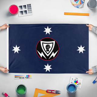 A mockup of the custom flag 'Australian Nationalist Squadron flag' held up on a table during print checking