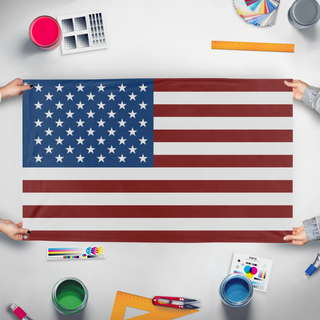 A mockup of the custom flag 'United States flag' held up on a table during print checking