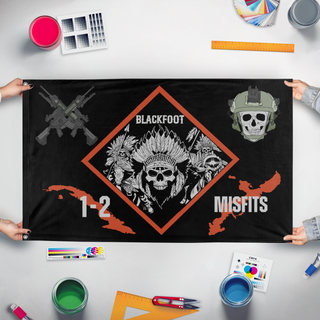 A mockup of the custom flag '1-2 og  flag' held up on a table during print checking