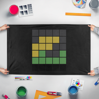 A mockup of the custom flag 'IRDMWORDLE flag' held up on a table during print checking