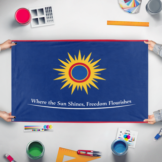 A mockup of the custom flag 'solara flag' held up on a table during print checking