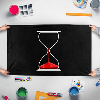 A mockup of the custom flag 'The Seaker flag' held up on a table during print checking