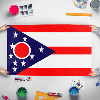 A mockup of the custom flag 'Ohio flag' held up on a table during print checking
