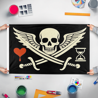 A mockup of the custom flag 'pirate flag' held up on a table during print checking
