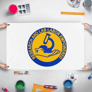 A mockup of the custom flag 'ralle_seal flag' held up on a table during print checking