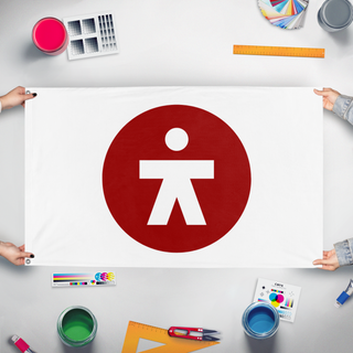 A mockup of the custom flag '02-03 test flag' held up on a table during print checking