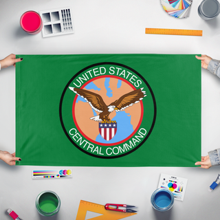 A mockup of the custom flag 'United States Central Command flag' held up on a table during print checking