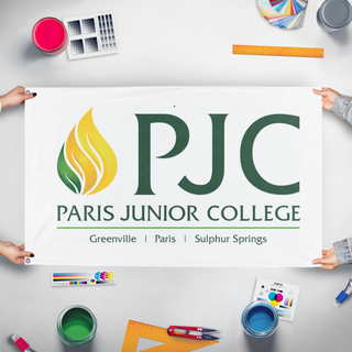 A mockup of the custom flag 'PJC  flag' held up on a table during print checking