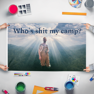 A mockup of the custom flag 'whoshitmycamp flag' held up on a table during print checking