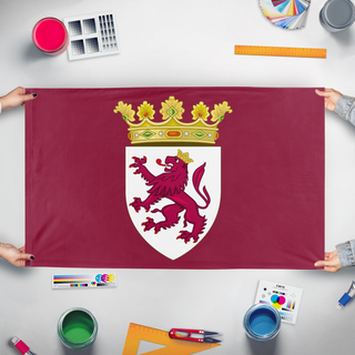A mockup of the custom flag 'Leon flag' held up on a table during print checking