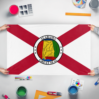 A mockup of the custom flag 'Alabama Redesign flag' held up on a table during print checking