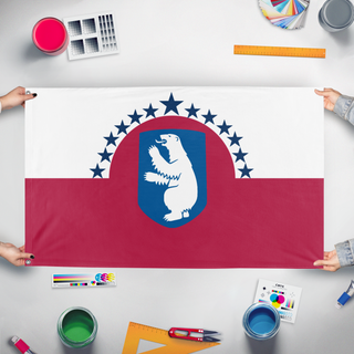 A mockup of the custom flag 'Greenland As a US State flag' held up on a table during print checking