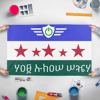 A mockup of the custom flag 'Itas flag' held up on a table during print checking