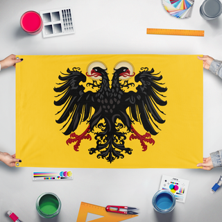 A mockup of the custom flag 'Holy Roman Empire flag' held up on a table during print checking