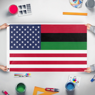 A mockup of the custom flag 'AfAmIn flag' held up on a table during print checking