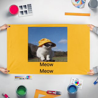 A mockup of the custom flag 'meowmeow flag' held up on a table during print checking