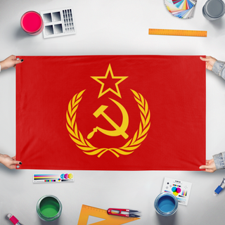 A mockup of the custom flag 'Alternate Version Of The USSR Flag' held up on a table during print checking