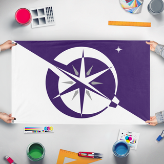 A mockup of the custom flag 'Ans flag' held up on a table during print checking