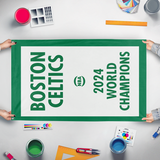 A mockup of the custom flag 'Boston Celtics 2024 World Championships flag' held up on a table during print checking