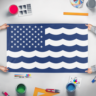 A mockup of the custom flag 'United States and Oceans of America flag' held up on a table during print checking