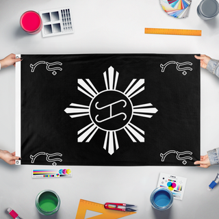 A mockup of the custom flag 'TT flag' held up on a table during print checking