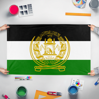 A mockup of the custom flag 'Afghan Opposition Flag' held up on a table during print checking