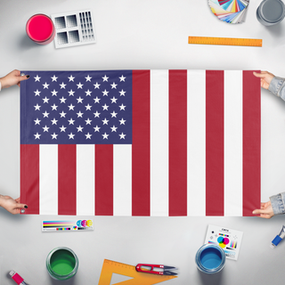 A mockup of the custom flag 'Vertical Bars United States flag' held up on a table during print checking