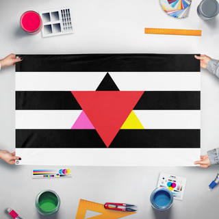 A mockup of the custom flag 'The Unit flag' held up on a table during print checking