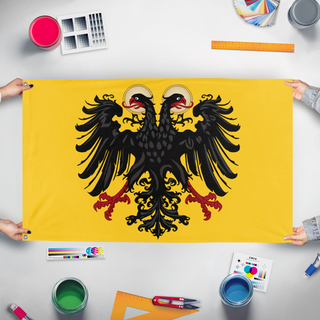 A mockup of the custom flag 'Holy Roman Empire flag' held up on a table during print checking