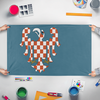 A mockup of the custom flag 'Margraviate of Moravia Redesigned  flag' held up on a table during print checking