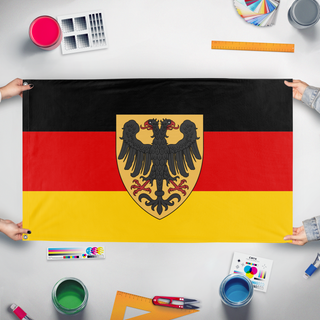 A mockup of the custom flag 'Alternate German Cofederation  flag' held up on a table during print checking