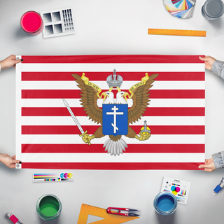 A mockup of the custom flag 'American Orthodoxy flag' held up on a table during print checking